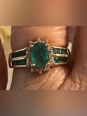 14 Karat emerald and diamond ring